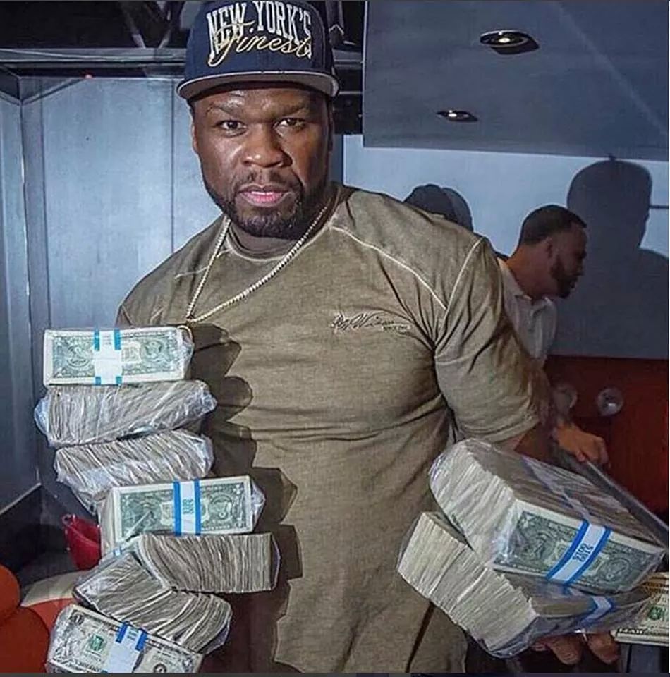 50 cent parties hard shows off huge cash - glamsquad magazine.
