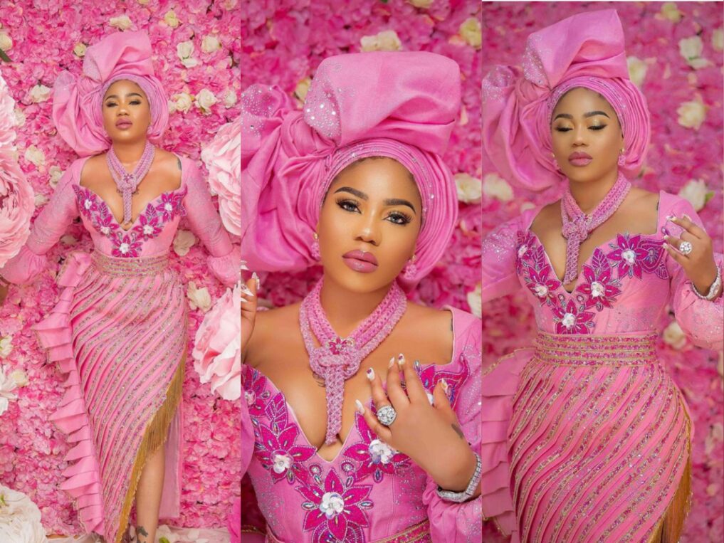Glam Look Of The Day: Toyin Lawani  Stuns in a Pink Aso-oke