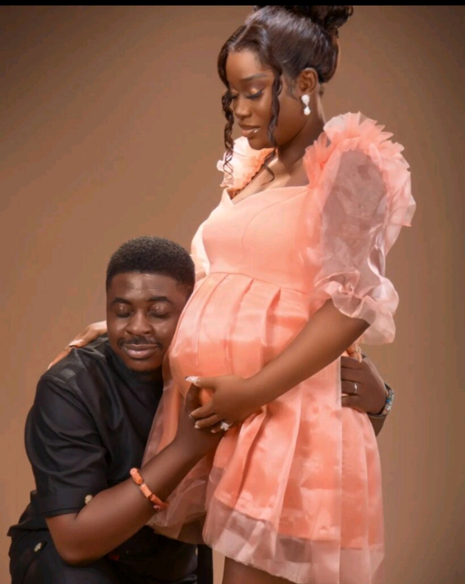 Comedian Young Elder, his wife and their baby
