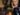 Portraits of diverse Black individuals showcasing varying skin tones, hair textures, and facial features representing Black genetic diversity.